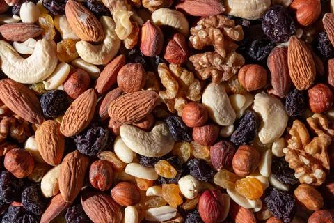 Mixed Nuts: Almonds, Walnuts, Cashews, Peanuts, Hazelnuts, Dried Prunes and.. Stock Photos