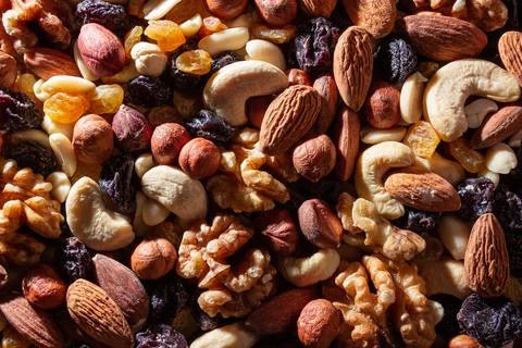 Mixed Nuts: Almonds, Walnuts, Cashews, Peanuts, Hazelnuts, Dried Prunes and.. Stock Photos