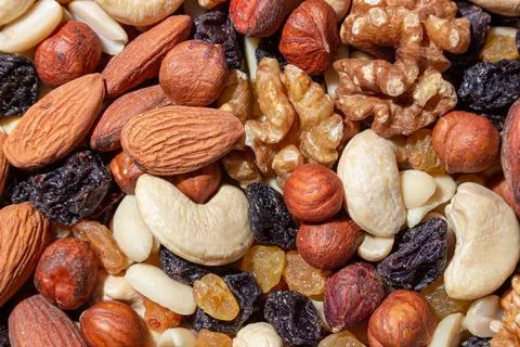 Mixed Nuts: Almonds, Walnuts, Cashews, Peanuts, Hazelnuts, Dried Prunes and.. Stock Photos