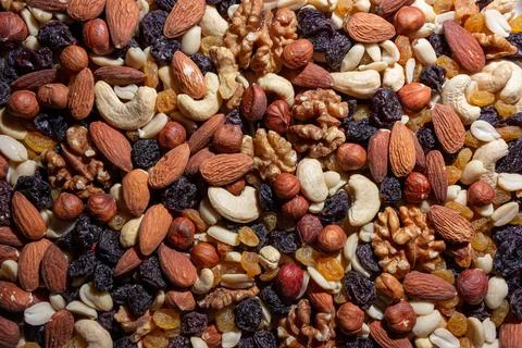 Mixed Nuts: Almonds, Walnuts, Cashews, Peanuts, Hazelnuts, Dried Prunes and R Stock Photos