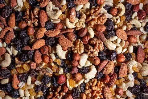 Mixed Nuts: Almonds, Walnuts, Cashews, Peanuts, Hazelnuts, Dried Prunes and.. Stock Photos