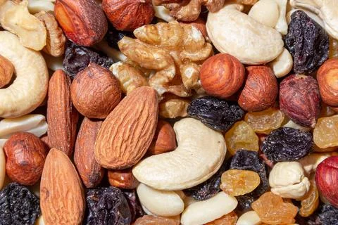 Mixed Nuts: Almonds, Walnuts, Cashews, Peanuts, Hazelnuts, Dried Prunes and R Stock Photos