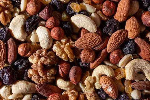 Mixed Nuts: Almonds, Walnuts, Cashews, Peanuts, Hazelnuts, Dried Prunes and.. Stock Photos