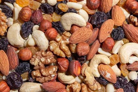 Mixed Nuts: Almonds, Walnuts, Cashews, Peanuts, Hazelnuts, Dried Prunes and.. Stock Photos