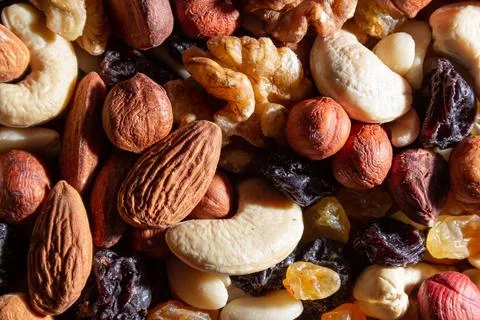 Mixed Nuts: Almonds, Walnuts, Cashews, Peanuts, Hazelnuts, Dried Prunes and.. Stock Photos