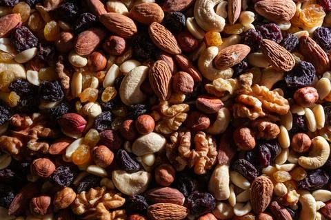 Mixed Nuts: Almonds, Walnuts, Cashews, Peanuts, Hazelnuts, Dried Prunes and.. Stock Photos