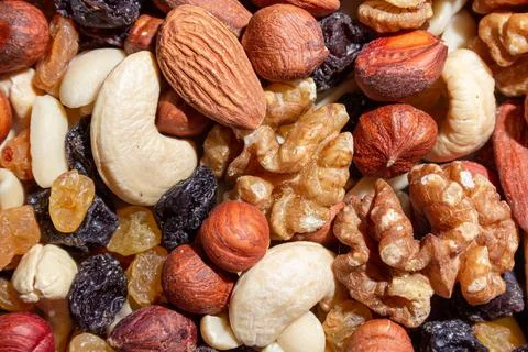 Mixed Nuts: Almonds, Walnuts, Cashews, Peanuts, Hazelnuts, Dried Prunes and.. Stock Photos