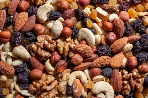 Mixed Nuts: Almonds, Walnuts, Cashews, Peanuts, Hazelnuts, Dried Prunes and.. Stock Photos