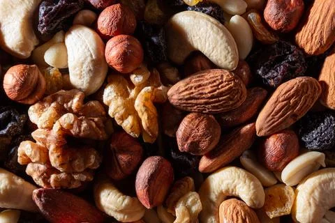 Mixed Nuts: Almonds, Walnuts, Cashews, Peanuts, Hazelnuts, Dried Prunes and.. Stock Photos