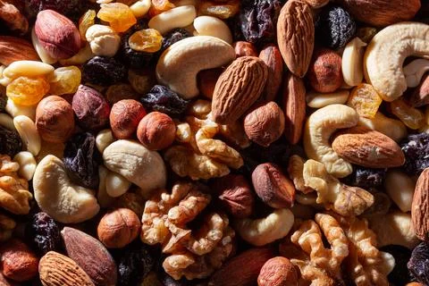 Mixed Nuts: Almonds, Walnuts, Cashews, Peanuts, Hazelnuts, Dried Prunes and R Stock Photos