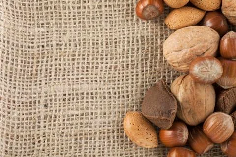Mixed nuts and burlap Stock Photos