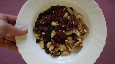 Mixed nuts and seeds prepared for a healthy everyday snack Stock Footage 340221505