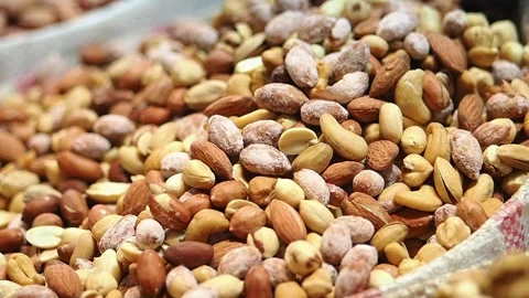Mixed nuts on display at local market for sale Stock Footage 334517242