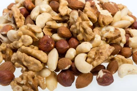 Mixed nuts  -  hazelnuts, walnuts, cashews,  pine nuts Foto stock