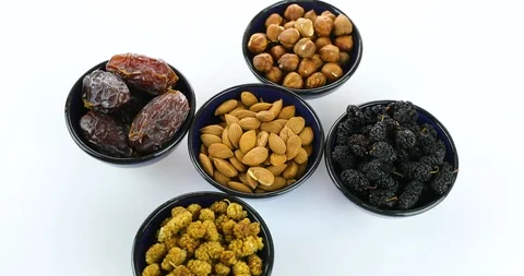Mixed nuts on white background Stock Footage 102411601