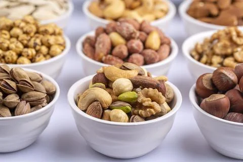Mixed nuts on a white background Stock Photos