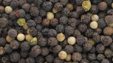 Mixed peppercorns heap in blender. Close-up shot. Stock Footage 86897336
