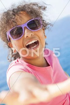 Mixed race african american girl child sunshine sunglasses Stock Photos