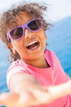 Mixed race african american girl child sunshine sunglasses Stock Photos