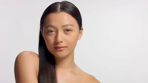 Mixed race asian model in studio beauty shoot Stock Footage 110731694