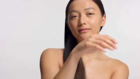 Mixed race asian model in studio beauty shoot Stock Footage 110731814