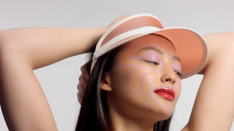 Mixed race asian model in studio creative art makeup Stock Footage 110732933