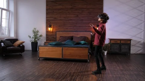 Mixed race boy exploring cyberspace in VR glasses Video stock 124934968