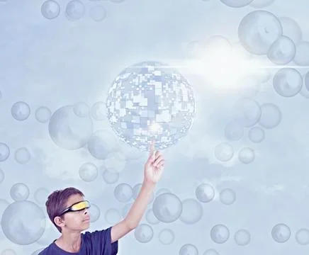 Mixed Race boy using vr goggles touching hovering pixel sphere Stock Photos