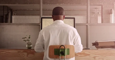 Mixed race businessman working with computer. backside dolly view Stock Footage 76551151