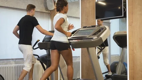 Mixed race couple have training in gym. Stock Footage 103745323