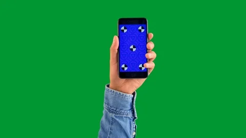 Mixed race deep skin tone male hand with smartphone with blue screen with Stock Footage 126587362
