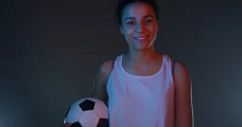 Mixed Race Female Model Gesturing To Play A Match Holding A Football  Stock Footage 112767331
