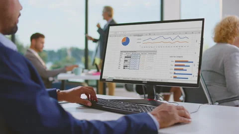 Mixed race man working on computer Stock Footage 164644922