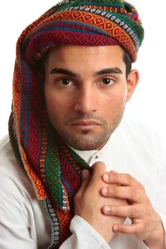Mixed race middle eastern man Mixed race middle eastern ethnic man wearing... Stock Photos