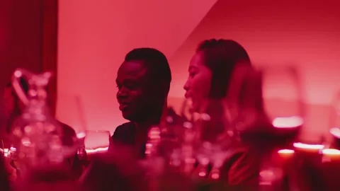 Mixed race people sitting inside restaurant talking making toasts having fun Stock Footage 158705800