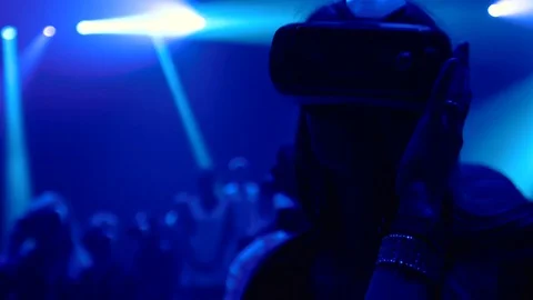 A Mixed Race People using Virtual Reality Glasses on Perfomance Show Stock Footage 76223471