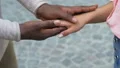 Mixed-race relations, afro-american man stroking hands of Caucasian woman HD Footage