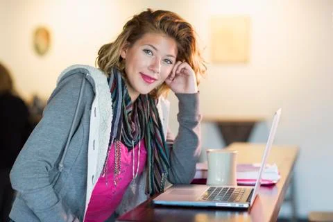 Mixed race teenage girl using laptop 写真素材