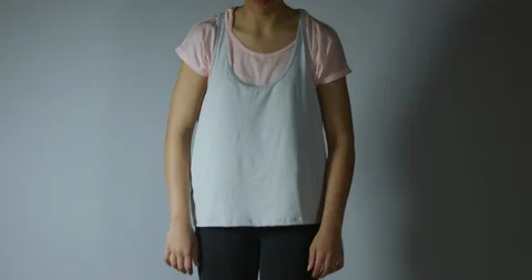 Mixed Race Yoga Instructor Rolling Out Pink Yoga Mat Getting Ready To Exercise  Stock Footage 112767616