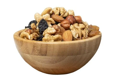 Mixed raw nuts isolated on white background. Special mixed nuts in bowl. Haze Stock Photos