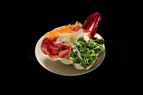 Mixed salad on a bread dish Stock Photos