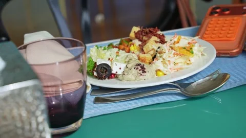 Mixed Salad Plate With Smartphone On Restaurant Table Stock Footage 336643631
