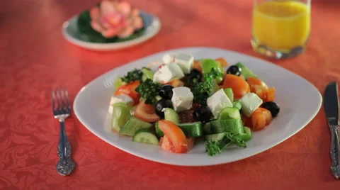 Mixed salad on the white plate Stock Footage 58304384