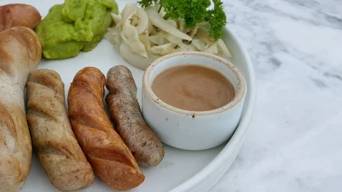 Mixed sausage with sauce Stock Footage 97044148