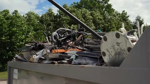 Mixed Scrap Metal Piled High in Outdoor Waste Container Vídeos de archivo 339158890