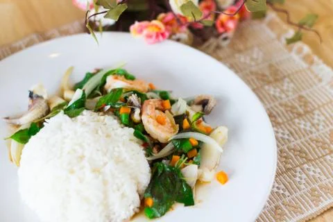 Mixed seafood basil with rice Stock Photos