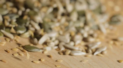 MIxed seeds falling in slow motion Video stock 34003245