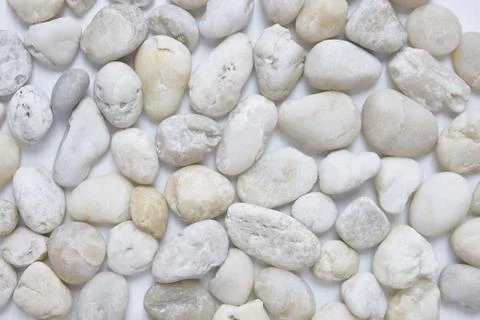 Mixed size of round pebbles stone from sea beach background texture Stock Photos