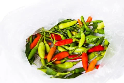 Mixed small birds eye chilli peppers Stock Photos