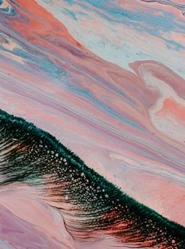 Mixed stains creating an abstract pattern in the water - a cool background 写真素材